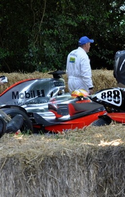 Reclining Biker admires Lewis Hamilton's F1 car